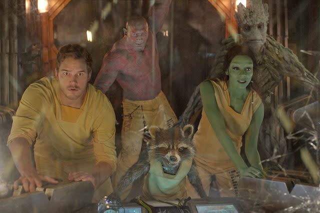 Walt Disney Studios Motion Pictures/Courtesy Everett Collection From left: Chris Pratt, Dave Bautista, Rocket (voiced by Bradley Cooper), Zoe Saldaña, and Groot (voiced Vin Diesel) in 'Guardians of the Galaxy'