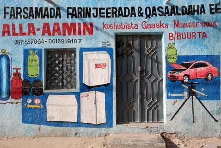 A mural is seen on a wall of a shop in Hodan district of Mogadishu, Somalia, June 10, 2017. REUTERS/Feisal Omar SEARCH "OMAR SHOPS" FOR THIS STORY. SEARCH "WIDER IMAGE" FOR ALL STORIES.