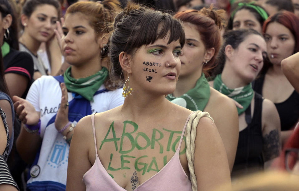 Activists demanding the legalization of legal, safe and free abortion take part in a demonstration during the so-called ‘Green Action Day for the Right to Abortion’, in front of the National Congress in Buenos Aires on February 19. Source: Juan Mabromata/AFP/Getty Image