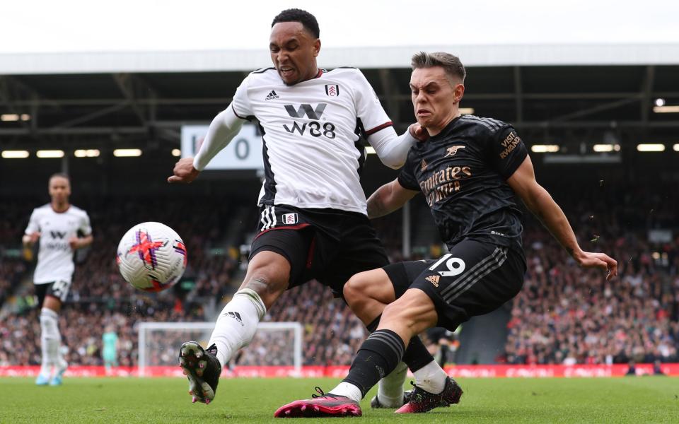 Leandro Trossard of Arsenal and Kenny Tete of Fulham during the Premier League - Getty Images/Jacques Feeney