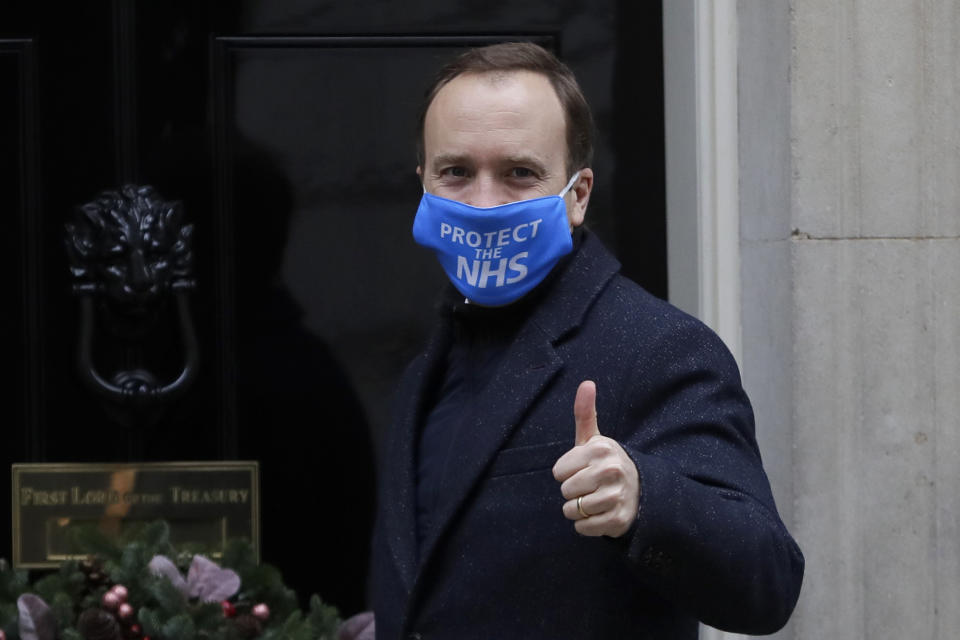 Britain's Health Secretary Matt Hancock arrives at Downing Street in London, Wednesday, Dec. 2, 2020. U.K. Health Secretary Matt Hancock on Wednesday thanked scientists from Pfizer and BioNTech after the approval of their COVID-19 vaccine for emergency use by the country's drugs regulator. Speaking earlier Hancock gave details of how the vaccine would be distributed from the beginning of next week. (AP Photo/Kirsty Wigglesworth)