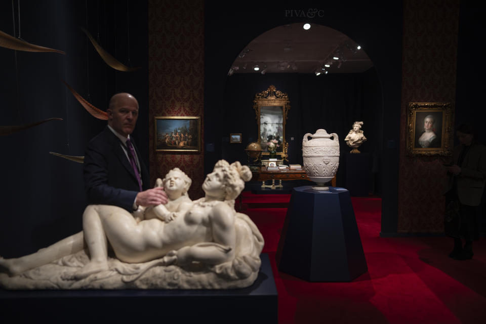 A Roman marble cinerary urn from around the 1st century AD is displayed Piva & C gallery at the European Fine Art Foundation, known by its acronym TEFAF, in Maastricht, southern Netherlands, Thursday, March 7, 2024. (AP Photo/Peter Dejong)
