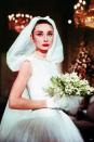 <p>Although Jo Stockton (Audrey Hepburn) was a heartbroken model when she first put on the <a href="https://www.theweddingsecret.co.uk/magazine/iconic-wedding-dresses-from-the-movies-funny-face/#:~:text=This%20classic%20'50s%2Dstyle%20gown,know%20and%20love%20Audrey%20for." rel="nofollow noopener" target="_blank" data-ylk="slk:Hubert de Givenchy short tulle wedding dress;elm:context_link;itc:0;sec:content-canvas" class="link ">Hubert de Givenchy short tulle wedding dress</a> in <em>Funny Face</em><em>,</em> by the end she was floating off with her desired in a truly iconic scene.<br></p>