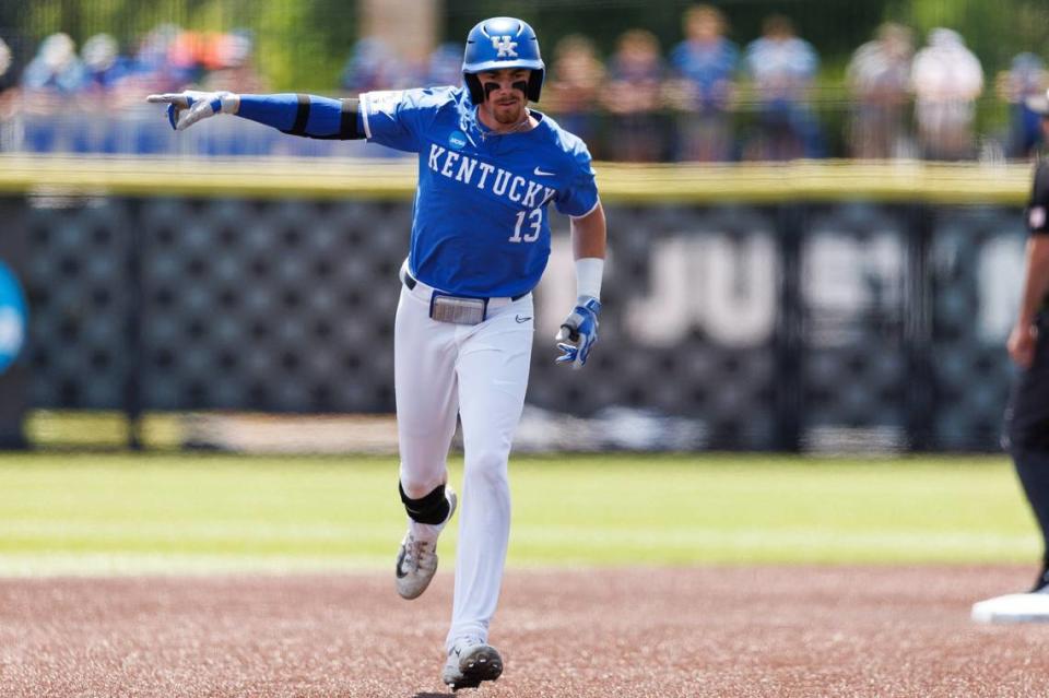 Kentucky’s James McCoy (13) celebrates after hitting a two-run homer in the second inning at Kentucky Proud Park on Friday.