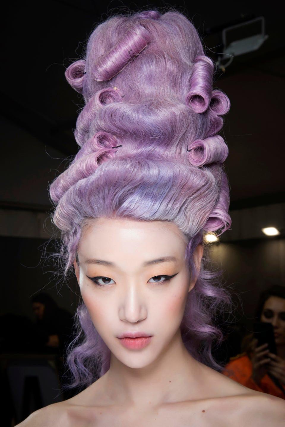 <p>Regency but make it Moschino. Pracariously towering updos in ice cream shades bring a sense of humour to the most fashion event of the season.</p>