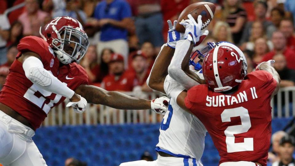 Alabama defensive backs Jared Mayden (21) and Patrick Surtain II (2) break up a pass intended for Duke wide receiver Jalon Calhoun (5) during the first half an NCAA college football game, Saturday, Aug. 31, 2019, in Atlanta. (AP Photo/John Bazemore)