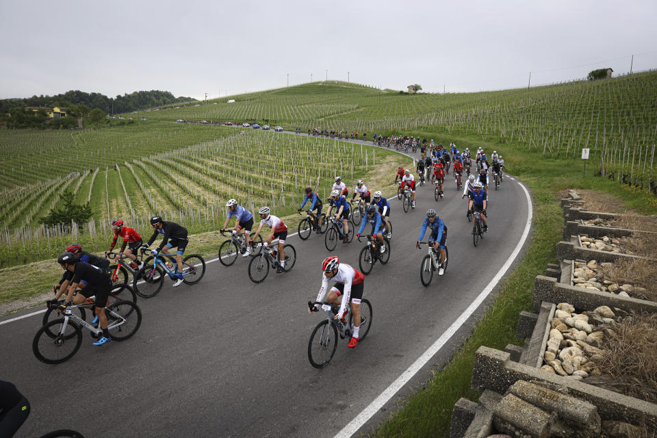 Cyclists compete at the third stage of the Giro d'Italia from Novara to Fossano, Italy, May 06, 2024. (Photo by Alessandro Garofalo/LaPresse via AP)