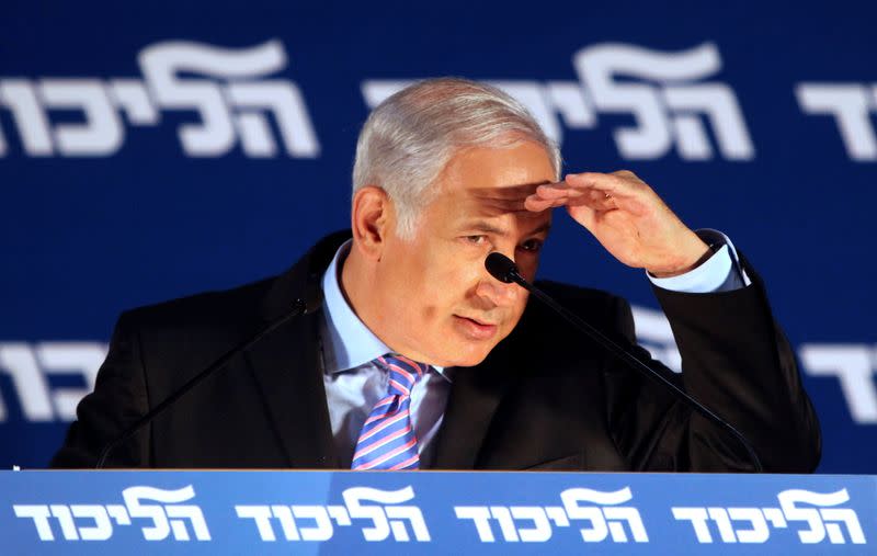 FILE PHOTO: Israel's PM Netanyahu gestures as he delivers his speech during his party's meeting for the upcoming Jewish New Year in Tel Aviv