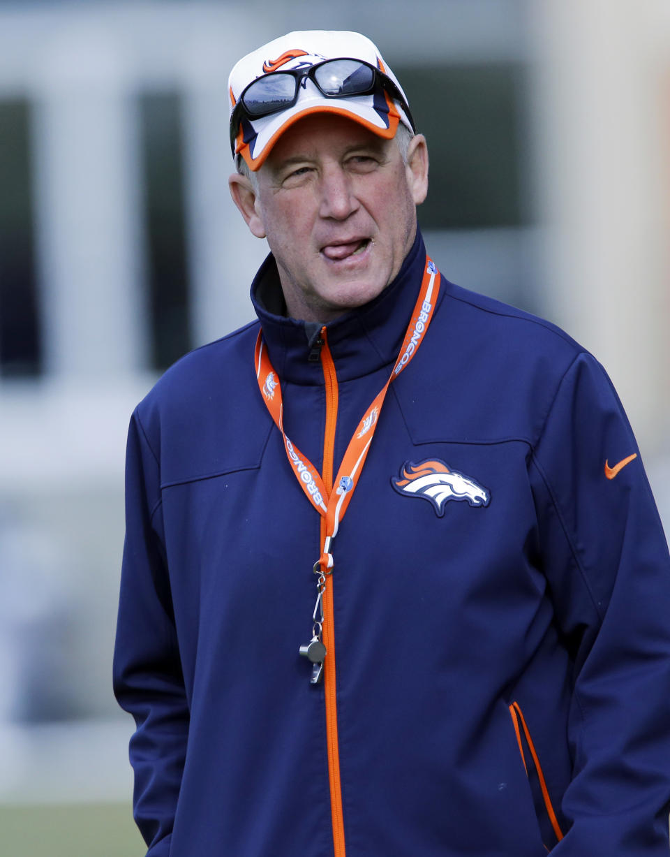 Denver Broncos head coach John Fox watches practice at the NFL Denver Broncos football training facility in Englewood, Colo., on Wednesday, Jan. 15, 2014. The Broncos are scheduled to play the New England Patriots on Sunday for the AFC Championship. (AP Photo/Ed Andrieski)