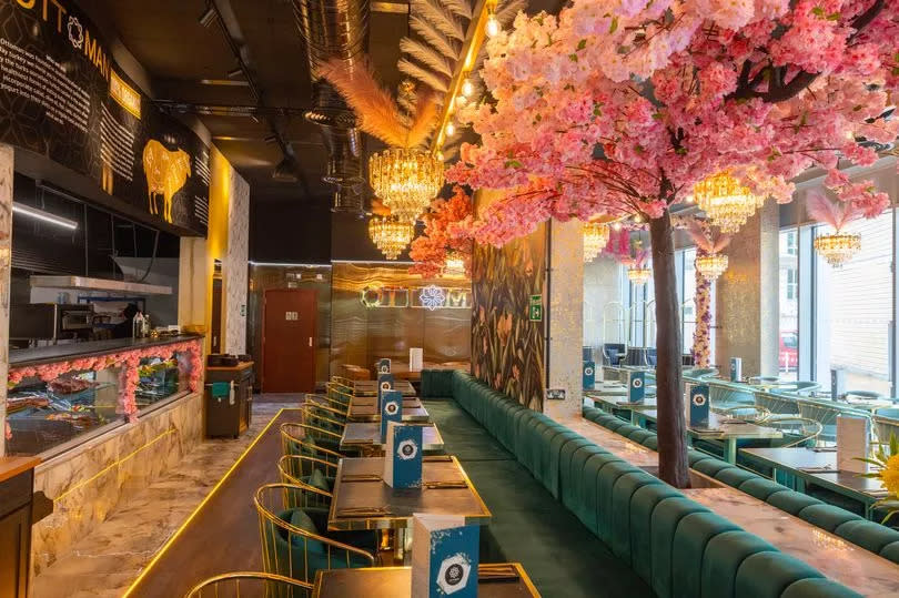 Lush interiors and cherry blossom decor await inside Modern Turkish restaurant Ottoman Bar and Grill
