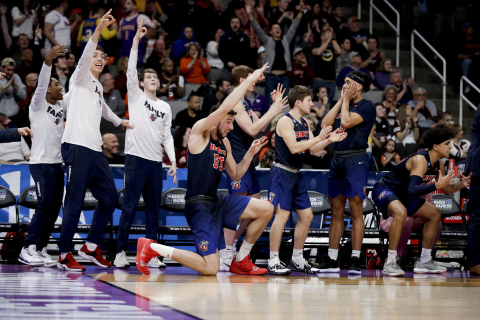 Liberty celebrates during the second half of a first round game against Mississippi State in the NCAA men's college basketball tournament Friday, March 22, 2019, in San Jose, Calif. (AP Photo/Ben Margot)