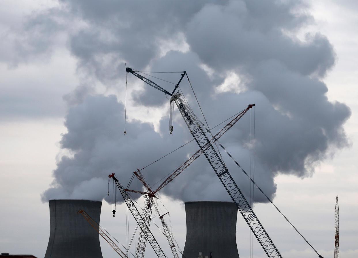 Steam rises from the cooling towers at the Plant Vogtle nuclear power plant in Augusta, Ga.