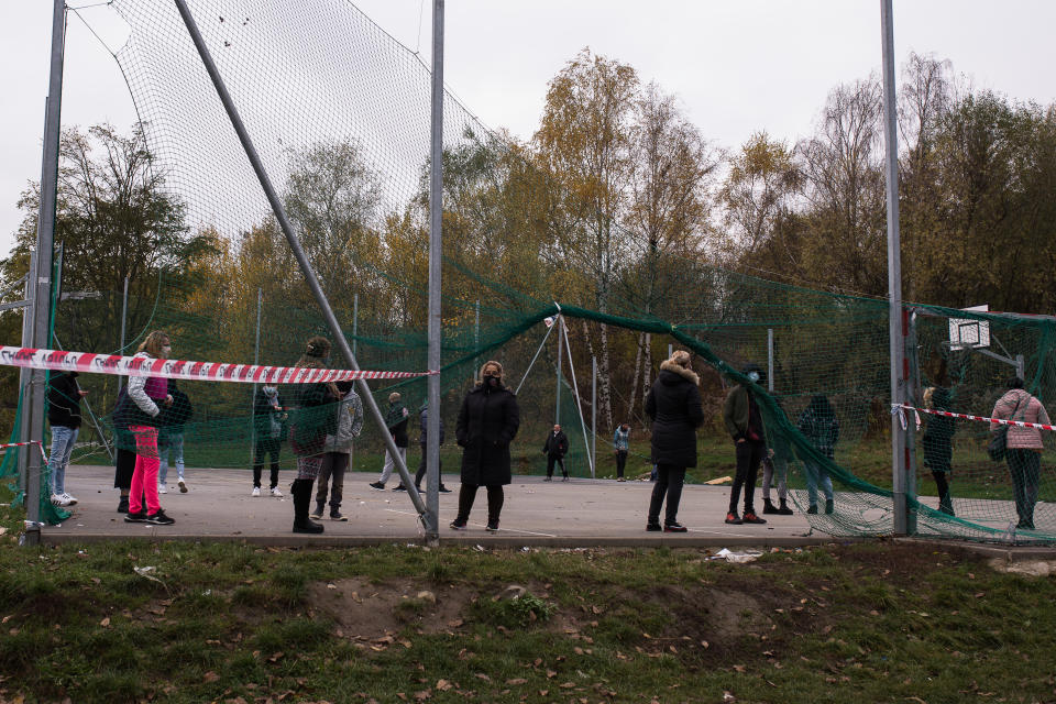 People wait for the results of a Covid-19 test on a playground in Slovakia.