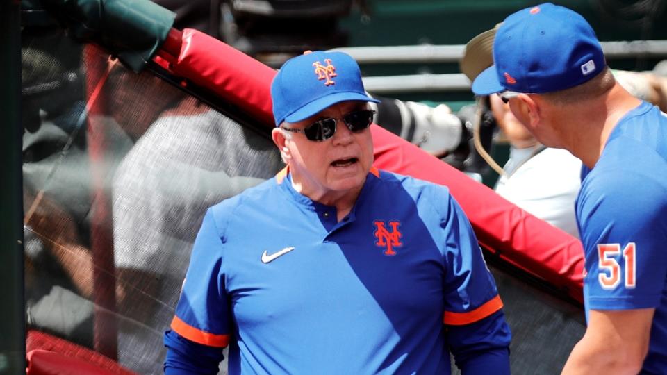 May 11, 2023;  Cincinnati, Ohio, USA;  New York Mets manager Buck Showalter (11) talks with bench coach Eric Chavez (51) at the beginning of their game with the Cincinnati Reds at Great American Ball Park.  Mandatory Credit: David Kohl-USA TODAY Sports