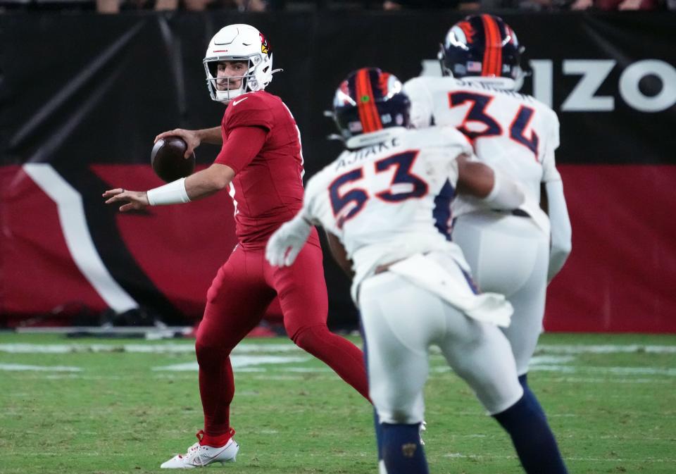 Arizona Cardinals quarterback David Blough (17) passes against the Denver Broncos during the second half at State Farm Stadium in Glendale on Aug. 11, 2023.