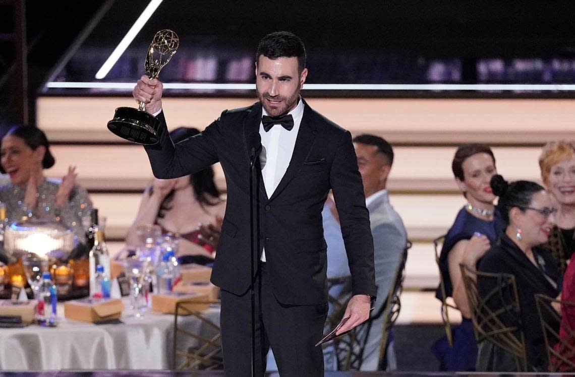 Brett Goldstein hoists his trophy for best supporting actor in a comedy series for “Ted Lasso” at the 74th Primetime Emmy Awards on Monday in Los Angeles.