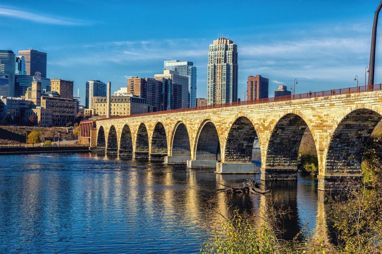 The Stone Arch Bridge leading towards downtown Minneapolis, Minnesota.