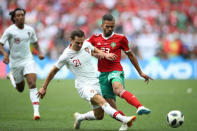 Soccer Football - World Cup - Group B - Portugal vs Morocco - Luzhniki Stadium, Moscow, Russia - June 20, 2018 Morocco's Mehdi Carcela in action with Portugal's Cedric Soares REUTERS/Carl Recine