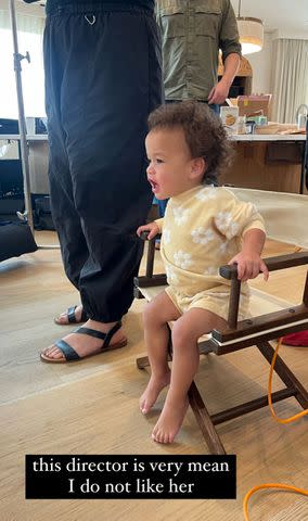 <p>Chrissy Teigen/Instagram</p> Chrissy Teigen is directed on her photo shoot by daughter Esti