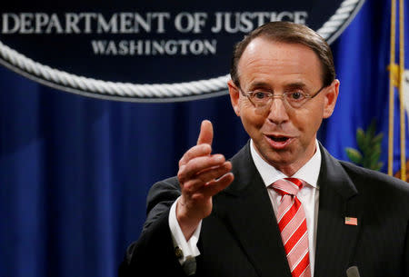 FILE PHOTO: Deputy U.S. Attorney General Rod Rosenstein announces grand jury indictments of 12 Russian intelligence officers in special counsel Robert Mueller's Russia investigation, during a news conference at the Justice Department in Washington, U.S., July 13, 2018. REUTERS/Leah Millis/File Photo