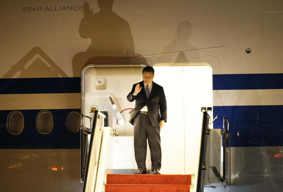 In this Thursday, Nov. 15, 2018, file photo, Chinese President Xi Jinping arrives at the airport in Port Moresby, Papua New Guinea. Xi arrives in the country for a state visit ahead of their annual APEC meeting. (AP Photo/Aaron Favila, File)