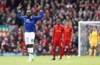 <p>Everton’s Romelu Lukaku celebrates after Matthew Pennington (not pictured) scored their first goal as Liverpool’s Georginio Wijnaldum and team mates look dejected </p>