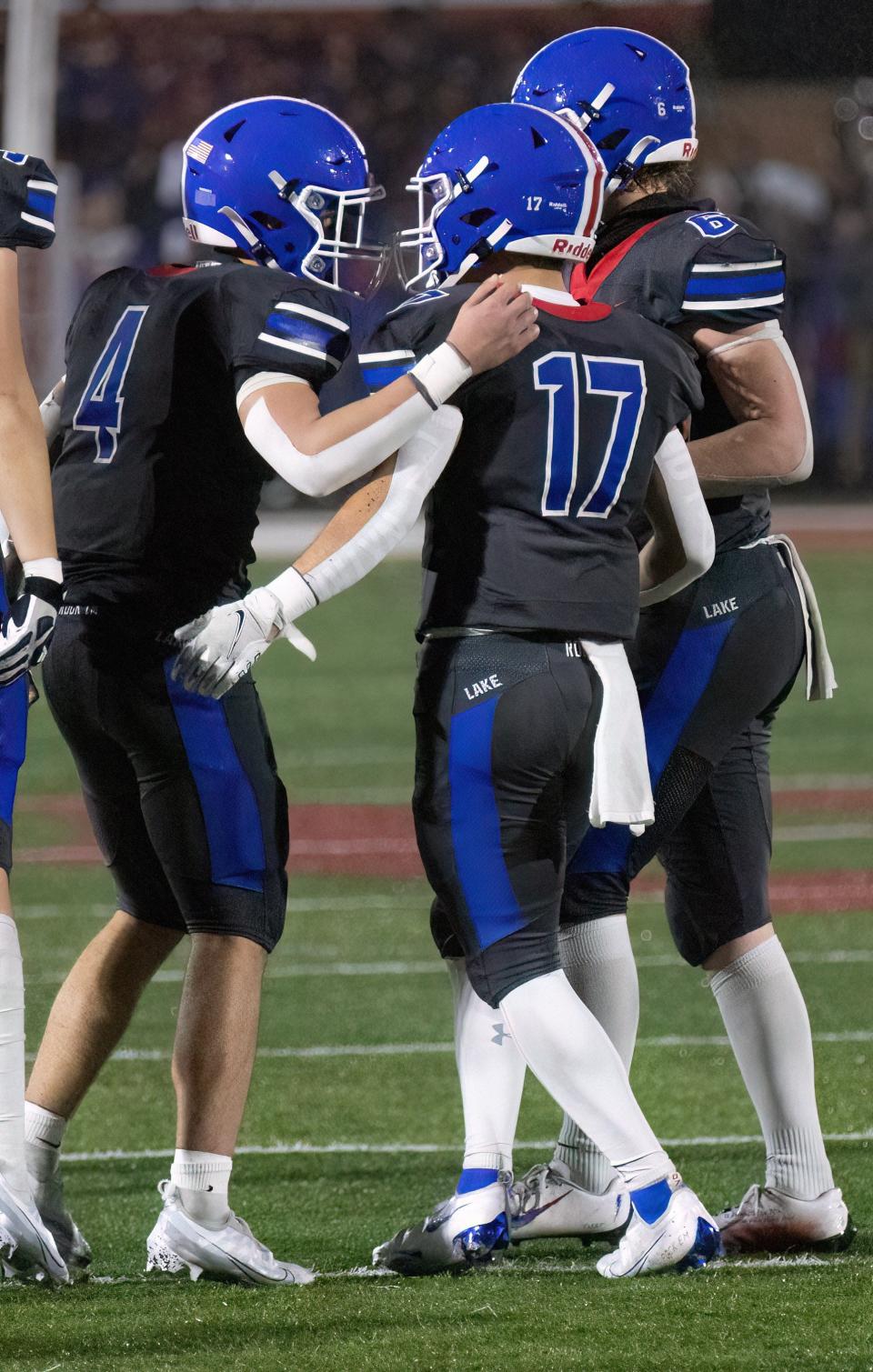 Lake’s Joseph Garro (4) congratulates Celton Dutton (17) after he made a field goal in the fourth quarter to give Lake a 10-7 lead over Westerville South on Friday, Nov. 11, 2022.