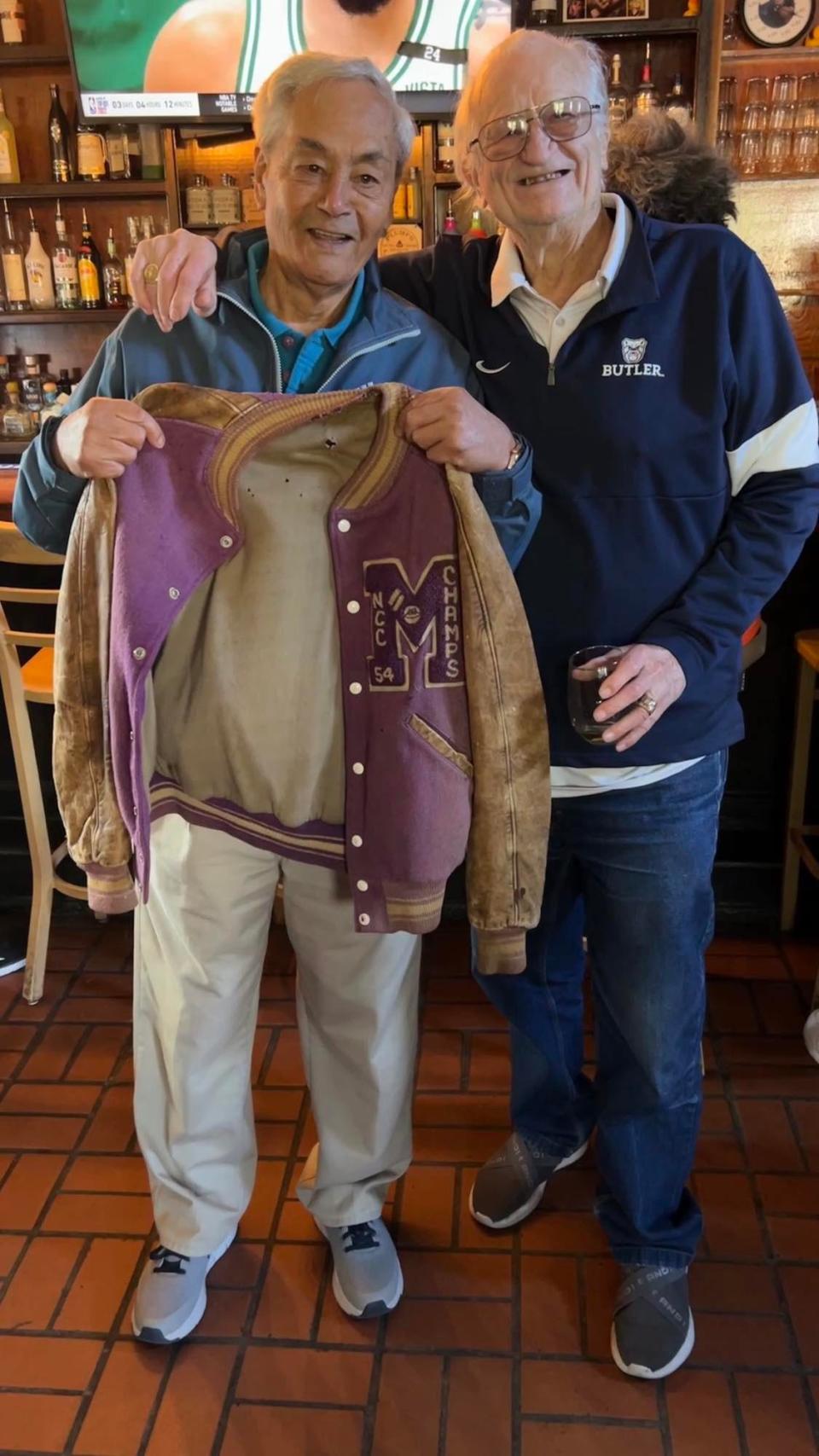 Leon Agullana, left, with Bobby Plump. Agullana played for Muncie Central in the historic Indiana high school state basketball championship game in 1954 against Plump, who played for Milan.