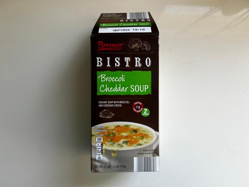 Black box of Bremer broccoli-cheddar soup on a white counter