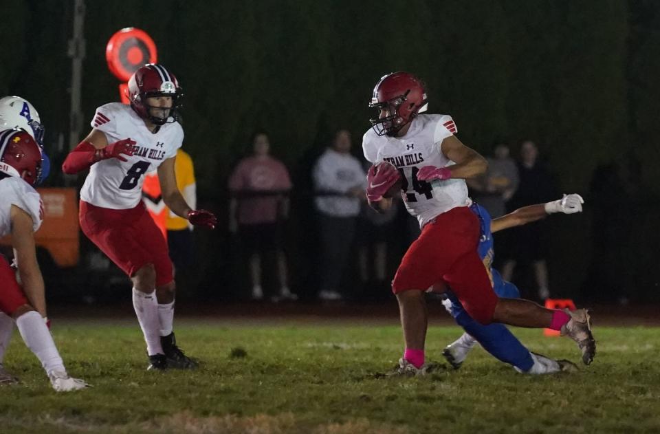 Byram Hills' Gavin Javorsky (24) with a carry during their 28-21 win over Ardsley in football action at Ardsley High School on Friday, October 7, 2022.