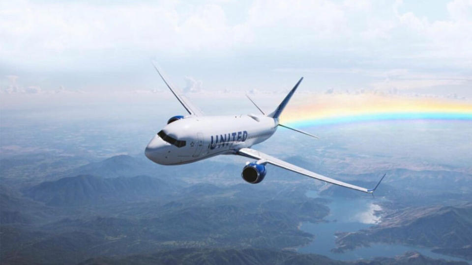 United plane in sky with rainbow