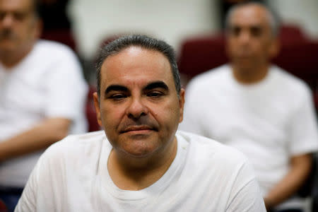 El Salvador's former president Elias Antonio Saca waits for his hearing on corruption charges in Santa Salvador, El Salvador, May 16, 2018. REUTERS /Jose Cabezas