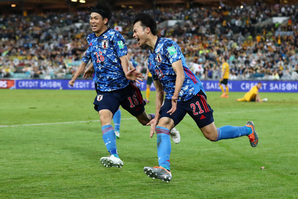 Seen here, Japan's Kaoru Mitoma celebrates scoring a goal during the FIFA 2022 World Cup qualifier against the Socceroos in Sydney.