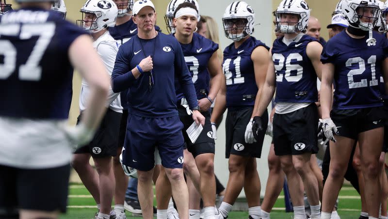 BYU defensive coordinator Jay Hill watches players during opening day of BYU spring football camp at the BYU Indoor Practice Facility in Provo, on Monday, March 6, 2023.