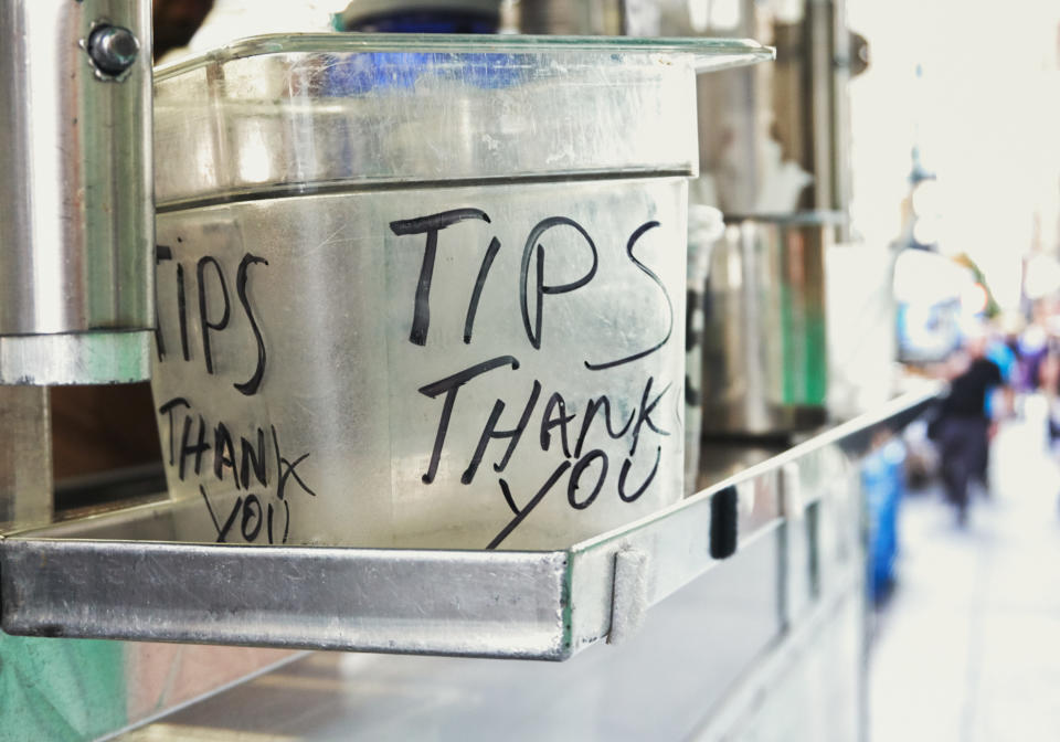 "Tips Thank You" Written on a Plastic Bucket