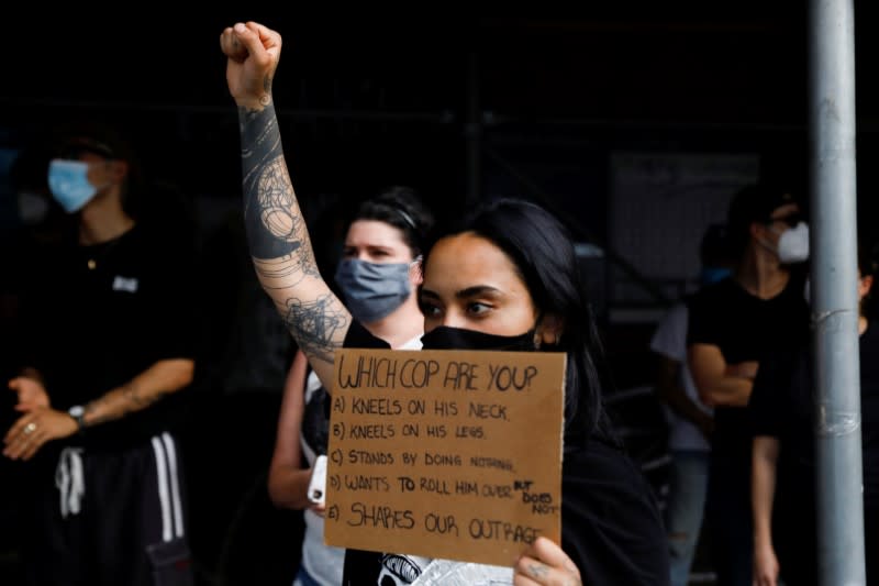 People take part in a Black Lives Matter protest in the Brooklyn borough of New York City