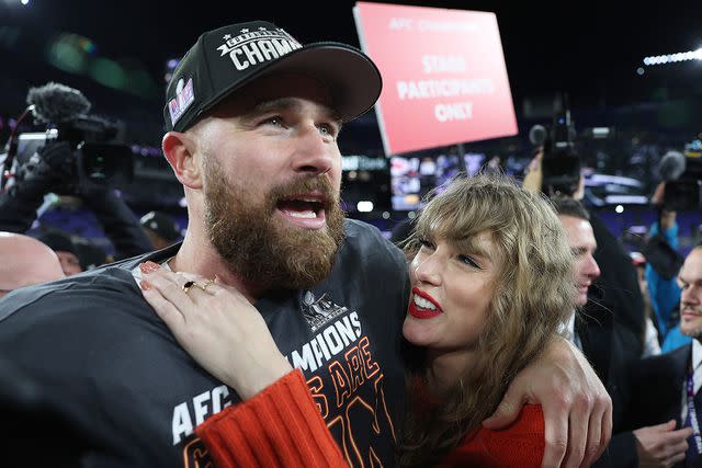 <p>Patrick Smith/Getty </p> Travis Kelce #87 of the Kansas City Chiefs celebrates with Taylor Swift after a 17-10 victory against the Baltimore Ravens in the AFC Championship Game
