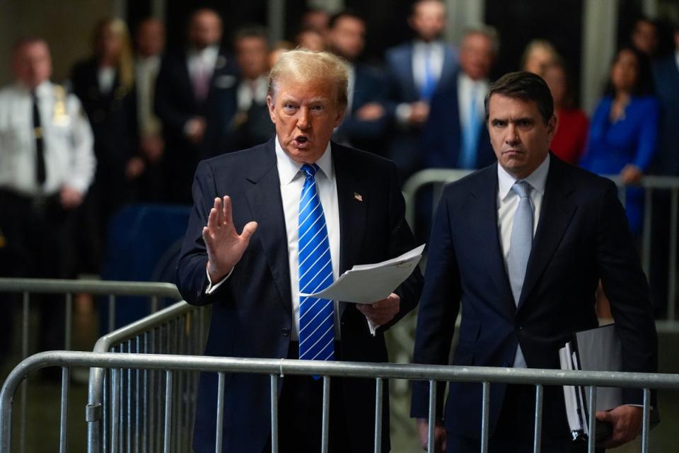 Trump speaks to to press after arriving at Manhattan criminal court on Monday (AP Photo/Seth Wenig, Pool)