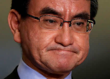 Japanese Foreign Minister Taro Kono speaks to media after a meeting with South Korean ambassador to Japan Lee Su-hoon (not pictured) at the Foreign Ministry in Tokyo, Japan October 30, 2018. REUTERS/Issei Kato
