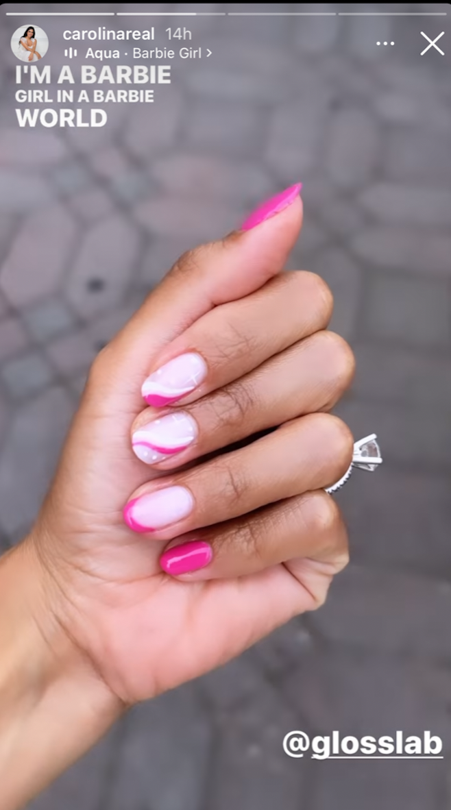 an instagram story of a pink manicure
