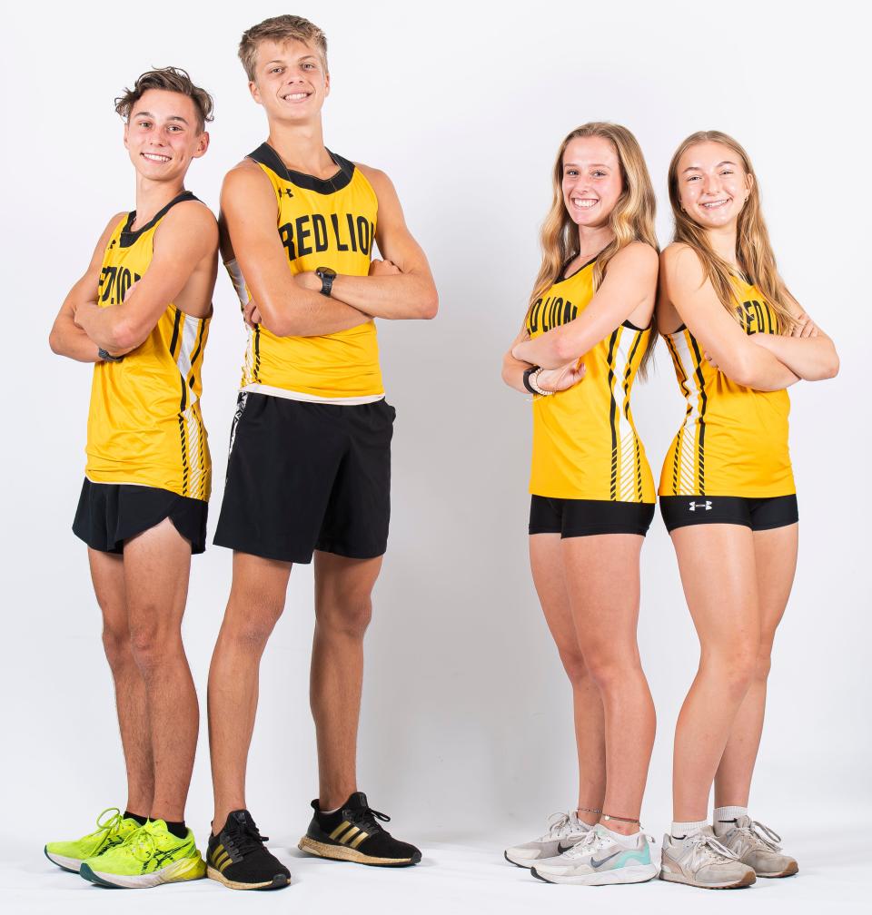 Red Lion cross country runners Parker Keiser, Daniel Naylor, Trista Webster and Grace Kauffman pose for a group photo during YAIAA fall sports media day on Thursday, August 3, 2023, in York.