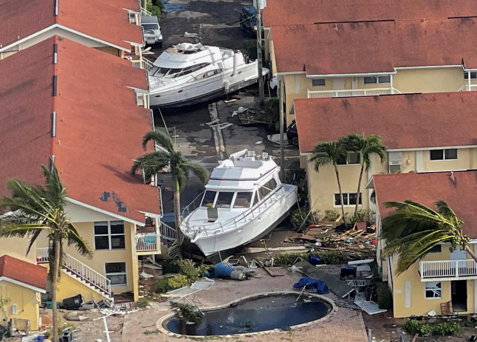 An aerial view of damaged boats and buildings after Hurricane Ian caused widespread destruction in Fort Myers, Florida, U.S., September 29, 2022. REUTERS/Shannon Stapleton