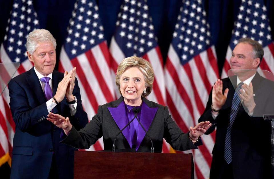 US Democratic presidential candidate Hillary Clinton makes a concession speech after being defeated by Republican presidential-elect Donald Trump as her running-mate Tim Kaine(R) and former president Bill Clinton look on in New York on November 9, 2016. / AFP / JEWEL SAMAD (Photo credit should read JEWEL SAMAD/AFP via Getty Images)