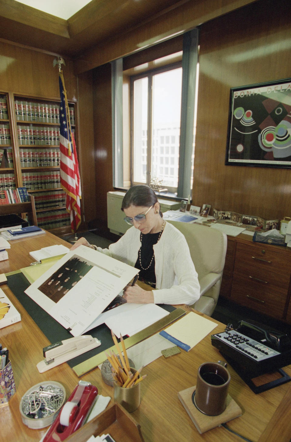 Supreme Court nominee Judge Ruth Bader Ginsburg works in her Washington office. The Senate Judiciary Committee voted unanimously to endorse the federal appeals judge’s nomination to sit on the high court. Full Senate confirmation followed, making her the 107th justice and the second woman on the U.S. Supreme Court. (Photo: Doug Mills/AP)