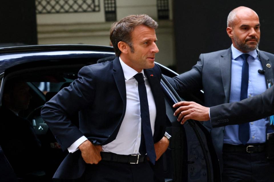 French President Emmanuel Macron arrives to attend a intermninisterial crisis unit meeting after riots erupted for the third night in a row (POOL/AFP via Getty Images)