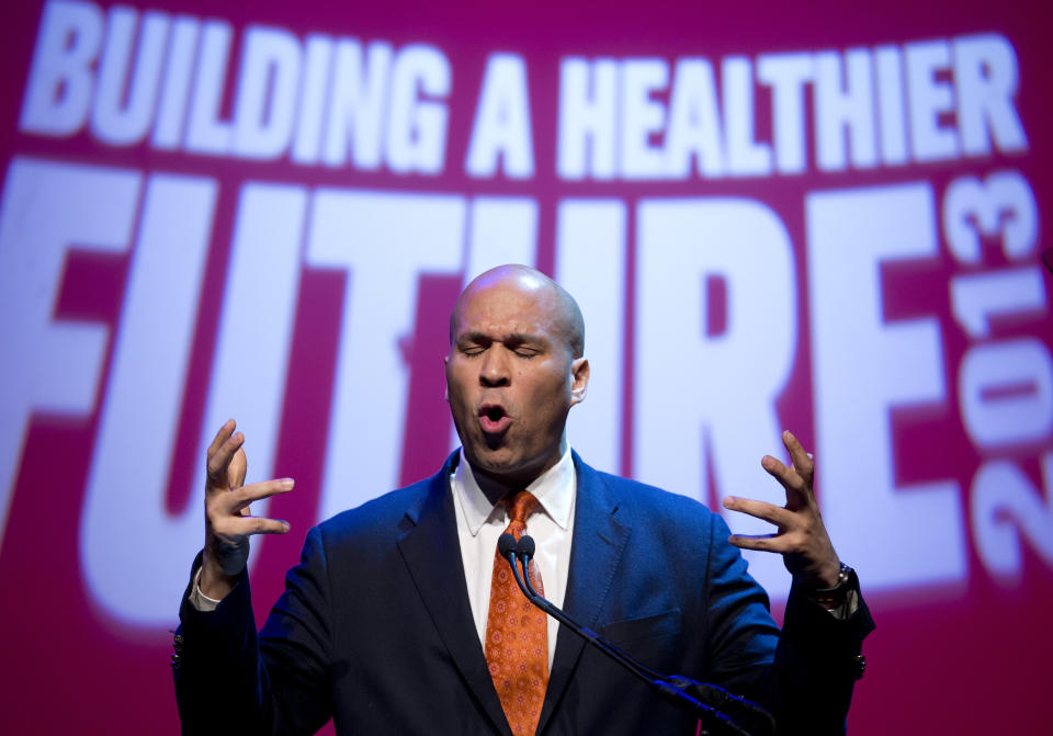 Newark, N..J. Mayor Cory Booker gestures as he speaks before first lady Michelle Obama, at the Partnership for a Healthier America's second Building a Healthier Future Summit on childhood obesity, Friday, March 8, 2013, at George Washington University's Lisner Auditorium in Washington. (AP Photo/Carolyn Kaster)