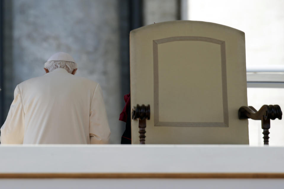 FILE - Pope Benedict XVI leaves after celebrating his last general audience in St. Peter's Square at the Vatican on Feb. 27, 2013. Pope Emeritus Benedict XVI, the German theologian who will be remembered as the first pope in 600 years to resign, has died, the Vatican announced Saturday. He was 95. (AP Photo/Gregorio Borgia, File)