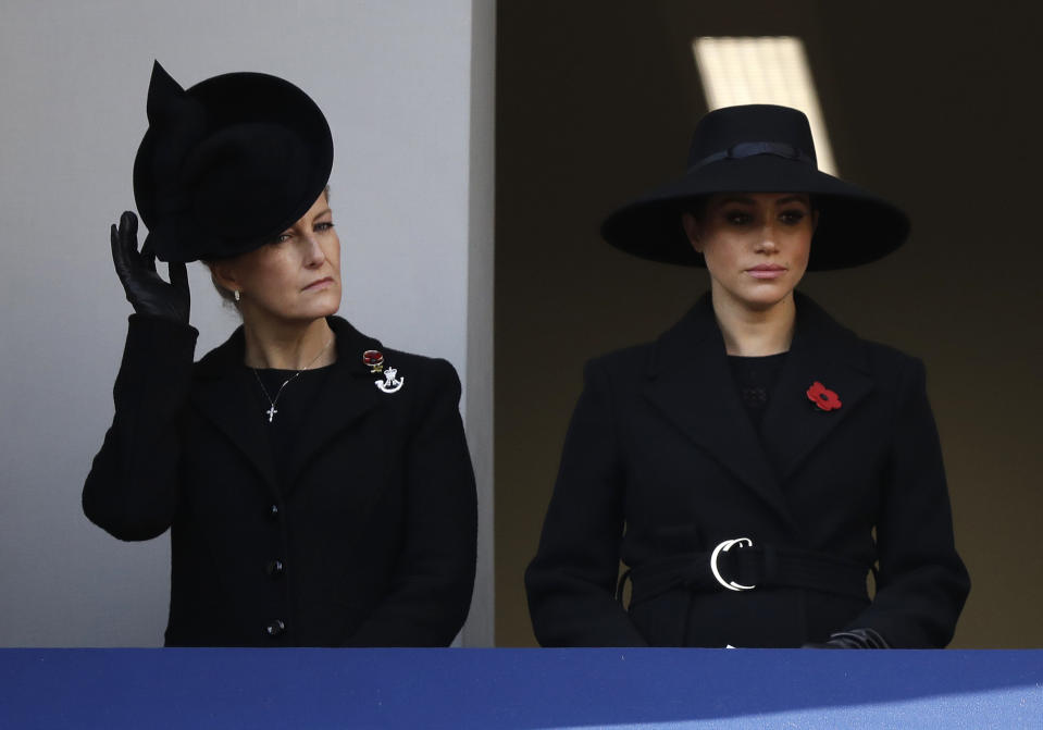 Meghan, Duchess of Sussex, right, and Sophie, Countess of Wessex attend the Remembrance Sunday ceremony at the Cenotaph in Whitehall in London, Sunday, Nov. 10, 2019. Remembrance Sunday is held each year to commemorate the service men and women who fought in past military conflicts. (AP Photo/Matt Dunham)