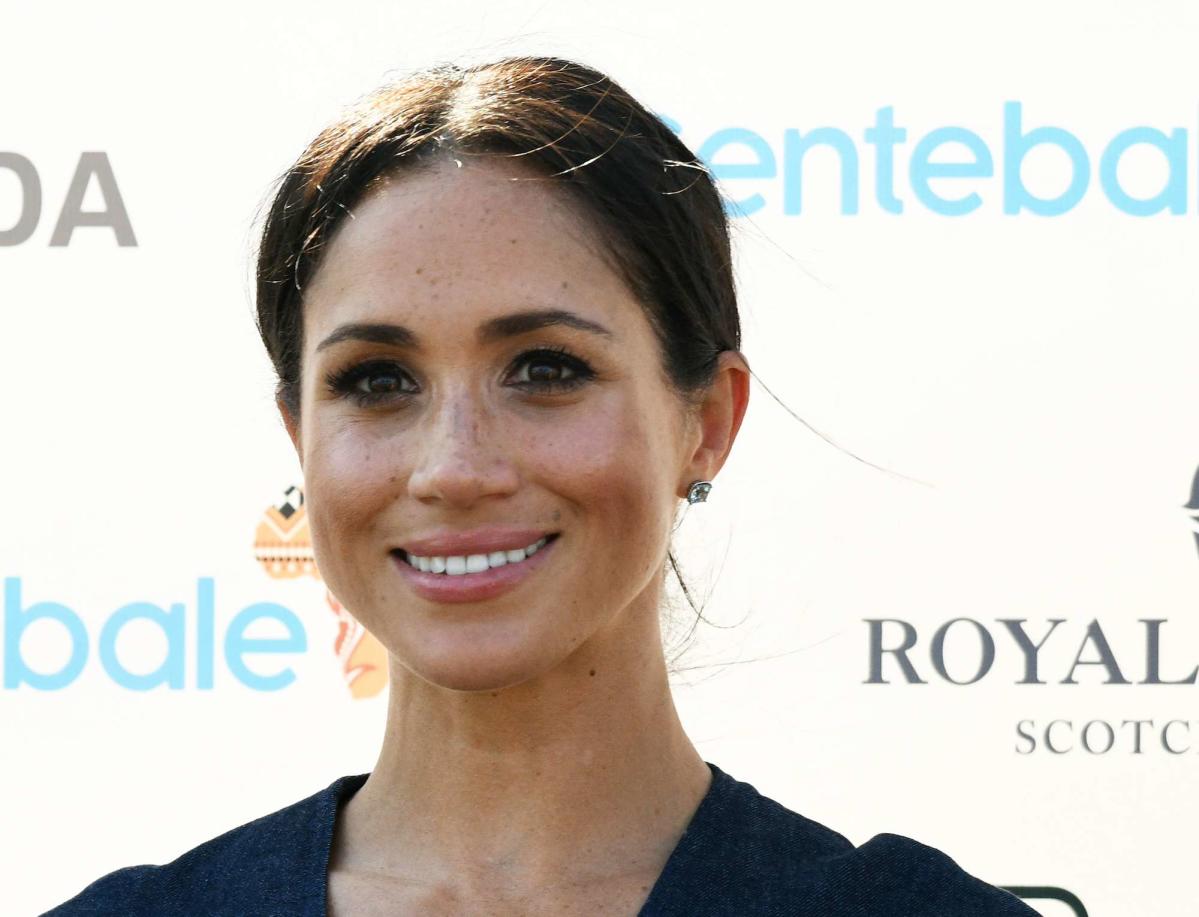 Meghan Markle wore a stylish backless dress with a cutout on the chest