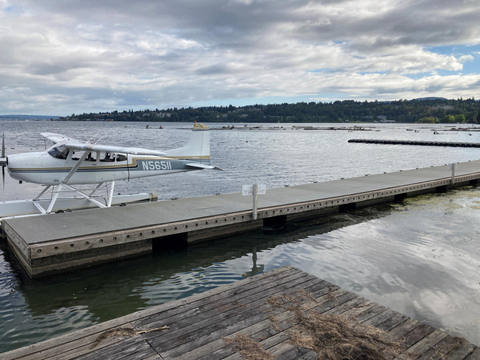 The home base for Northwest Seaplanes and Friday Harbor Seaplanes at the Renton Municipal Airport was quiet Monday, Sept. 5, 2022, as they awaited reports from the U.S. Coast Guard, which is searching the waters of Puget Sound northwest of Seattle after one of their floatplanes crashed on Sunday, Sept. 4, afternoon. One body was recovered and nine remained missing on Monday. (AP Photo/Martha Bellisle)